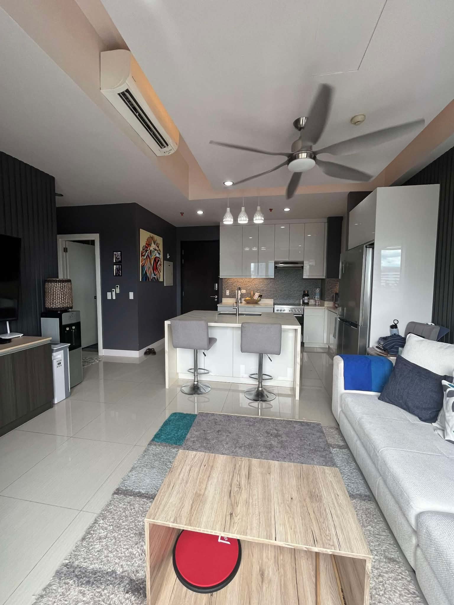 Calyx Residences Unit 9D — Living, dining & kitchen — view 2