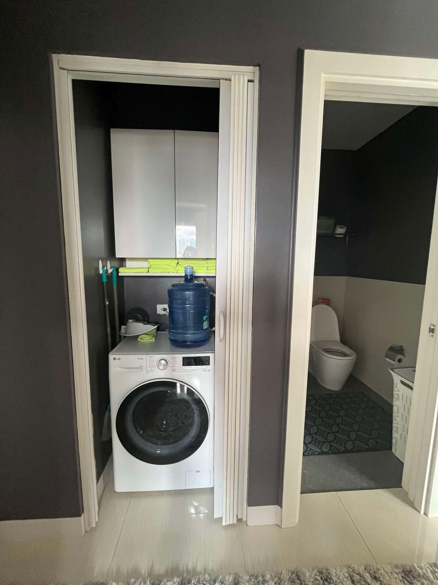 Calyx Residences Unit 9D — Utility / laundry area — view 4